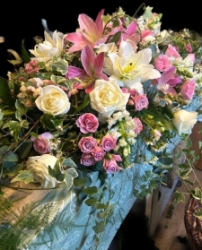 pink and white casket spray